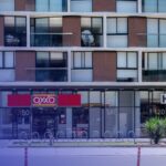 ¿Tienen que pagar los dueños de locales comerciales la instalación de un ascensor en el edificio?